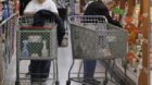 Shoppers make their way through the aisle of the Wal-Mart store in Mayfield Heights, Ohio on Thursday, Nov. 13, 2008. The New