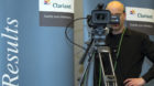 A cameraman films during a press conference on the fourth quarter and full-year results 2011of Clariant in Zurich, Switzerlan