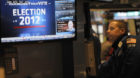 A trader works on the floor of the New York Stock Exchange the day after Pres. Barack Obama was re-elected, Wednesday, Nov. 7
