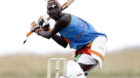 Thomas Takare of the Maasai Cricket Warriors plays a shot against the Ambassadors of Cricket from India during their Twenty20