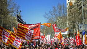 Protesters take part in a rally against the economic policy of the Conservative Spanish Governmentin Barcelona, Spain, Sunday