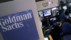 FILE - In this March 15, 2012 file photo, a trader works in the Goldman Sachs booth on the floor of the New York Stock Exchan
