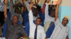 Somali MPs raise their hands during session to impeach the Somali Prime Minister Abdi Farah Shirdon, in Mogadishu, Somalia, M