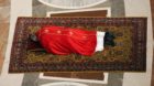 Pope Francis lies as he prays during the Celebration of the Lord's Passion in Saint Peter's Basilica at the Vatican April 18,