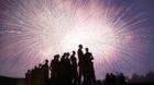 Fireworks explode in the sky above a monument to victims of the holocaust during events to mark Victory day in Moscow May 9, 