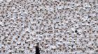 Underclassmen listen from the back of the stadium as U.S. President Barack Obama speaks at a commencement ceremony at the Uni