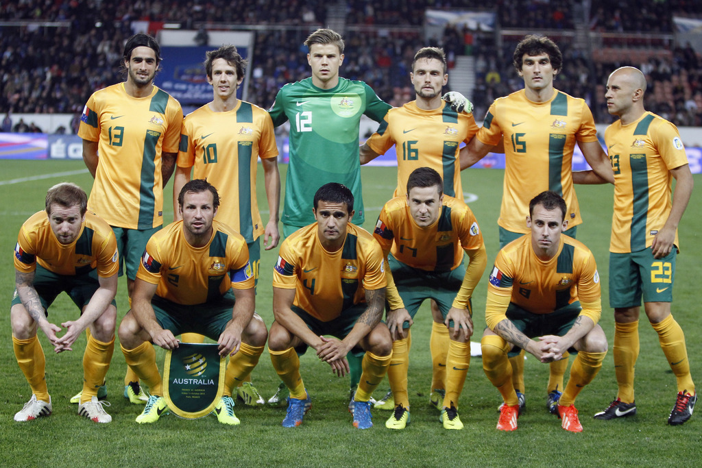FILE - In this Oct. 11, 2013 file photo, Australia soccer team poses prior to the start their international soccer friendly match between France and Australia at the Parc Des Princes stadium in Paris, France. Background from left: Rhys Williams, Robbie Kr