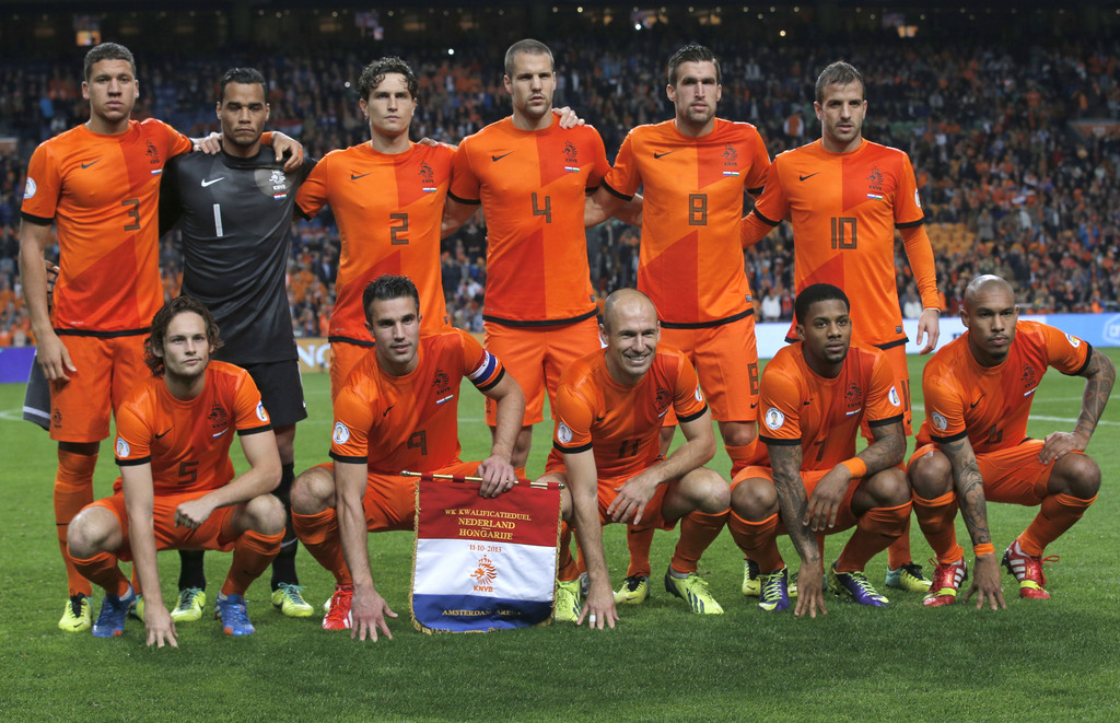 FILE - In this Oct. 11, 2013 file photo, Dutch soccer team poses prior the start the Group D World Cup qualifying soccer match between Netherlands and Hungary, at Arena stadium in Amsterdam, Netherlands. Background from left: Jeffrey Bruma, Michel Vorm, D