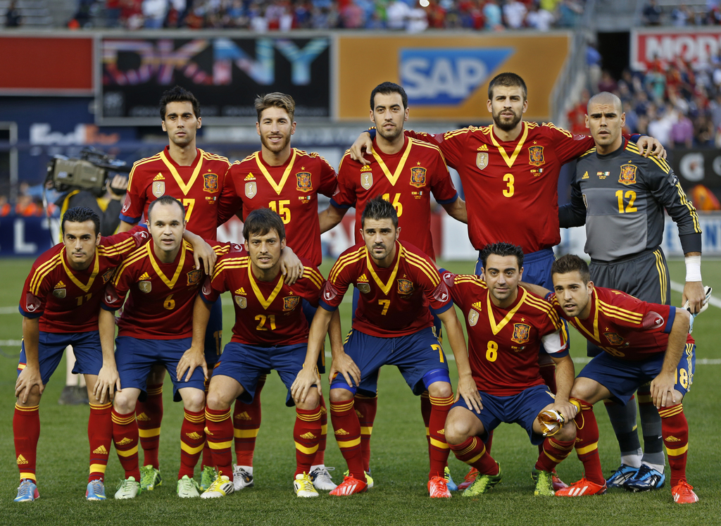 FILE - In this June 11, 2013 file photo, Spain soccer team poses prior to the start their international friendly soccer match against Ireland at Yankee Stadium in New York. Foreground from left, Pedro, Andres Iniesta, David Silva, Davis Villa, Xavi Hernad