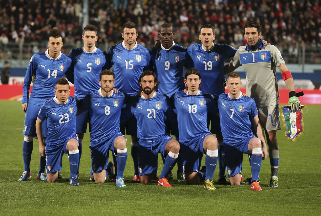 FILE - In this March, 26, 2013 file photo, Italy soccer team poses prior to the start the World Cup Group B qualifying soccer match between Malta and Italy at National Stadium Ta' Qali in Valletta, Malta. Foreground from left, Antonio Noscerino, Claudio M