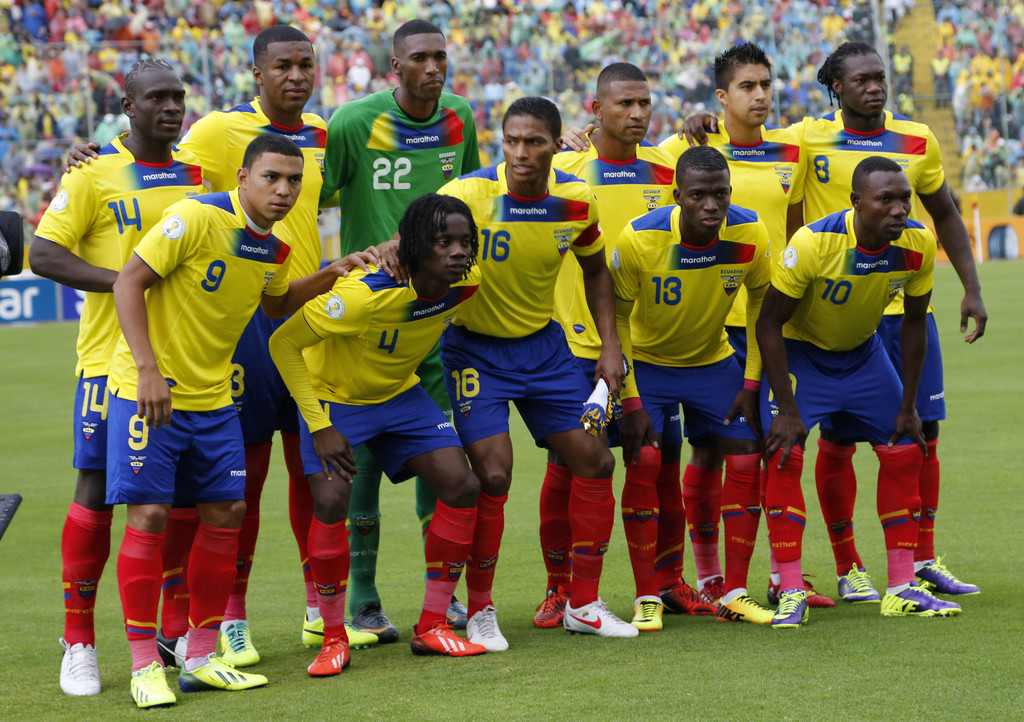 FILE - In this Oct. 11, 2013 file photo, Ecuador national team poses prior to the start the 2014 World Cup qualifying soccer match between Ecuador and Uruguay in Quito, Ecuador. Foreground from left: Jefferson Montero, Juan Carlos Paredes, Antonio Valenci