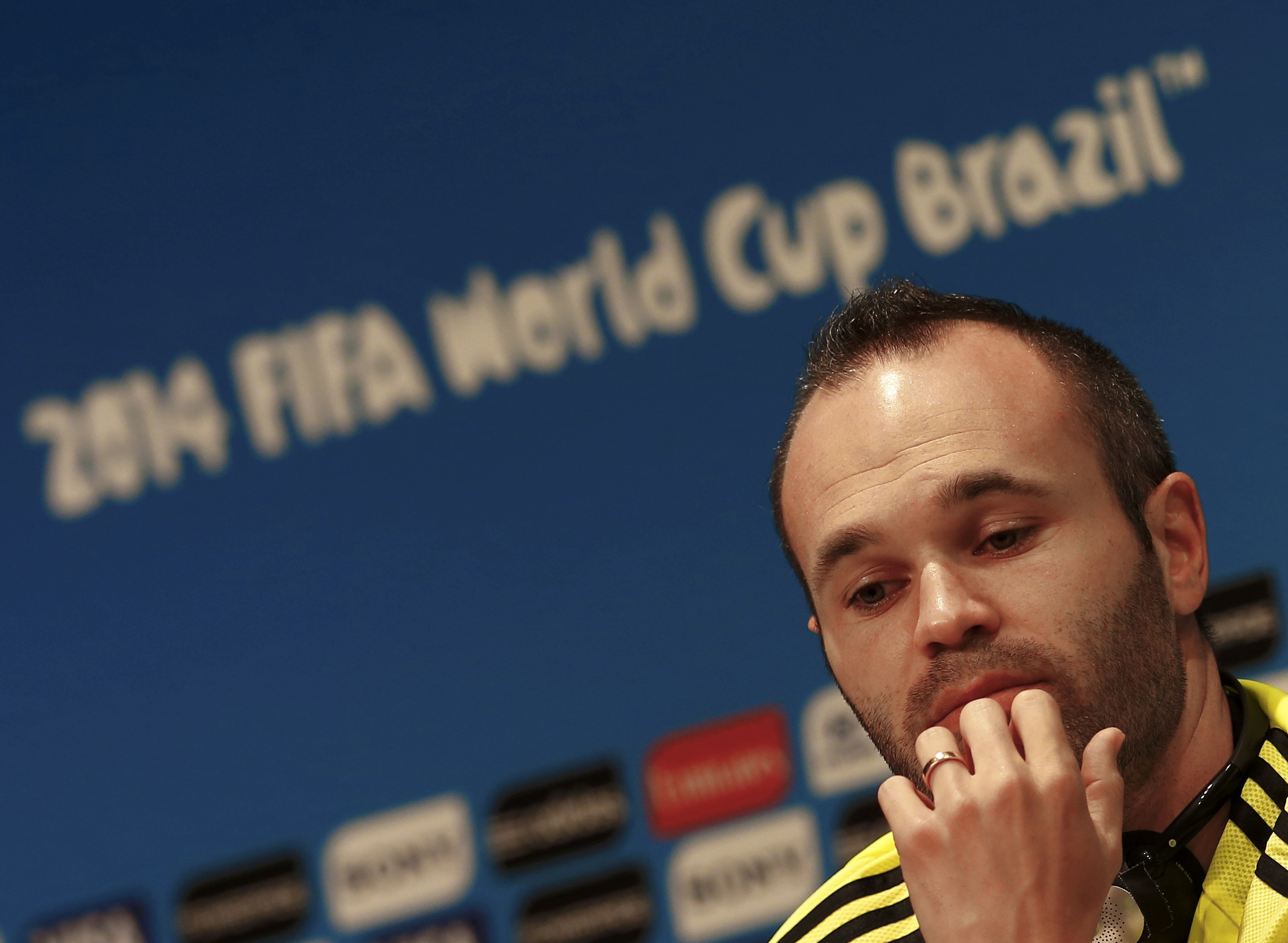 Spain's Andres Iniesta attends a news conference at Maracana stadium ahead of their 2014 World Cup match against Chile in Rio de Janeiro June 17, 2014.   REUTERS/Ricardo Moraes (BRAZIL  - Tags:  SOCCER SPORT WORLD CUP)  