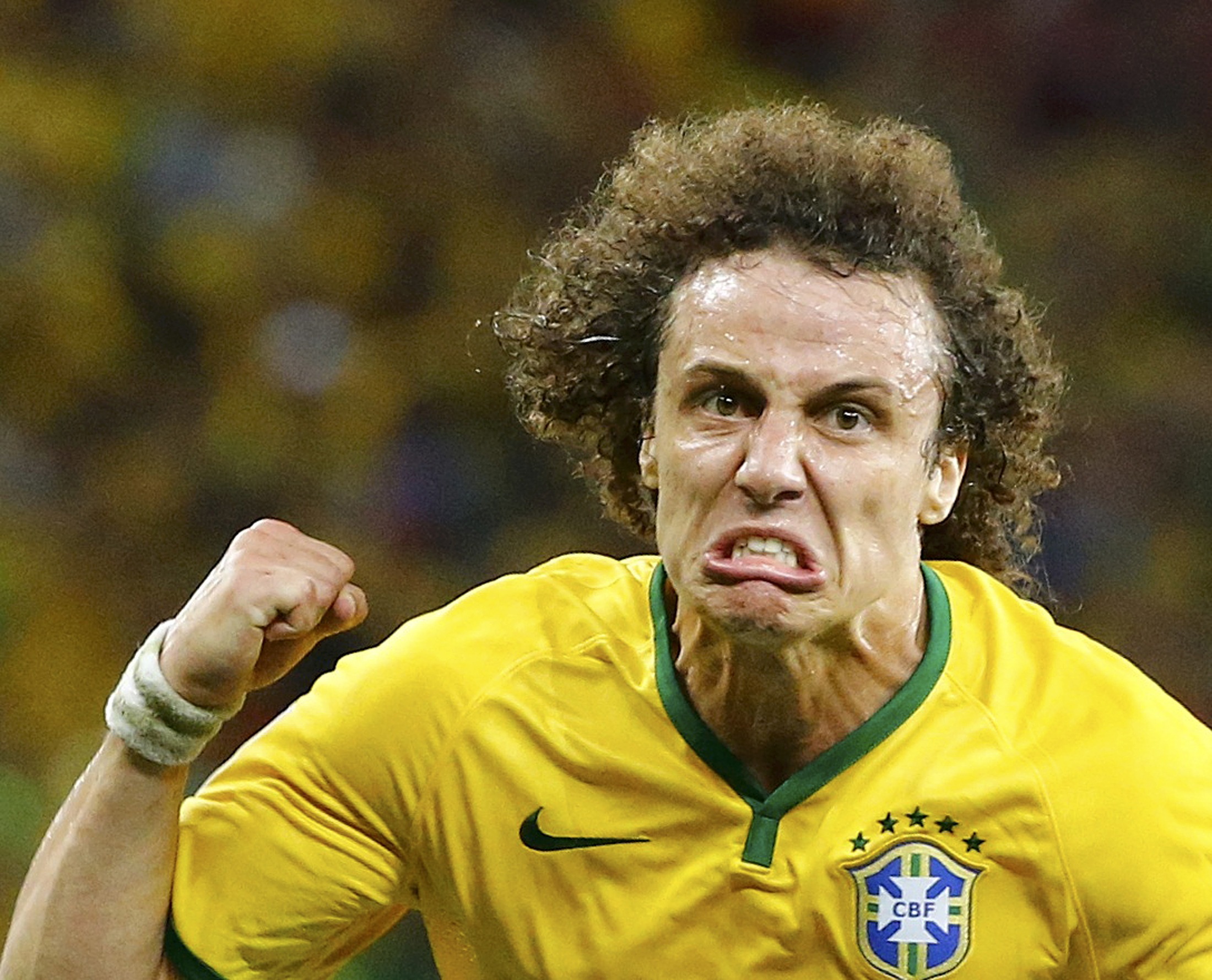Brazil's David Luiz celebrates after scoring a goal against Colombia during the 2014 World Cup quarter-finals soccer match at the Castelao arena in Fortaleza July 4, 2014.      REUTERS/Stefano Rellandini (BRAZIL  - Tags: SOCCER SPORT WORLD CUP)  