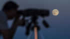 epa04348912 The August full moon also known as 'supermoon' is observed by a scientist at los Llanos de Espiel, in CÛrdoba, s