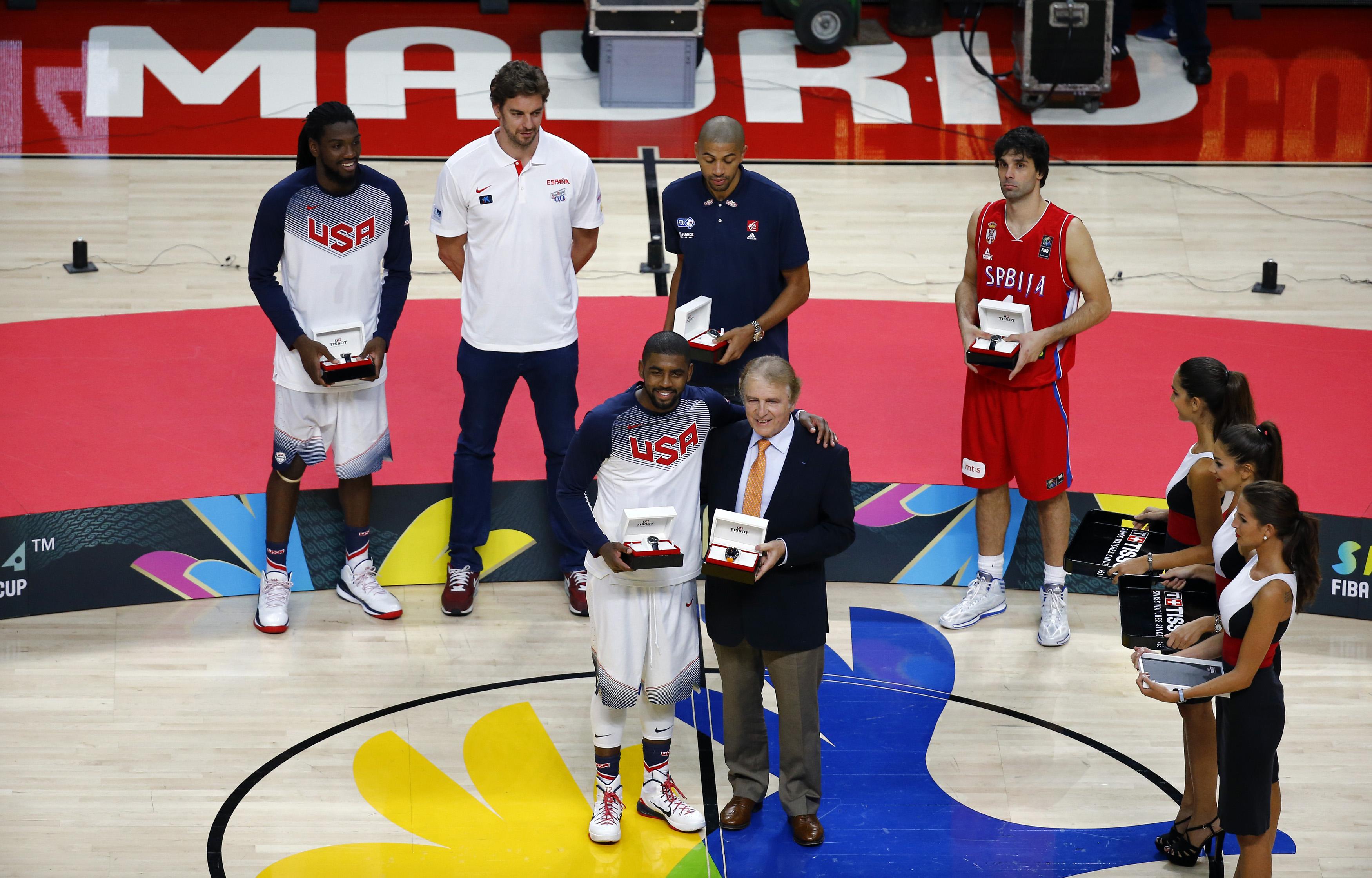 U.S. player Kyrie Irving (C) poses after being named most valuable player after their Basketball World Cup final game against Serbia in Madrid September 14, 2014. REUTERS/Susana Vera (SPAIN - Tags: SPORT BASKETBALL)