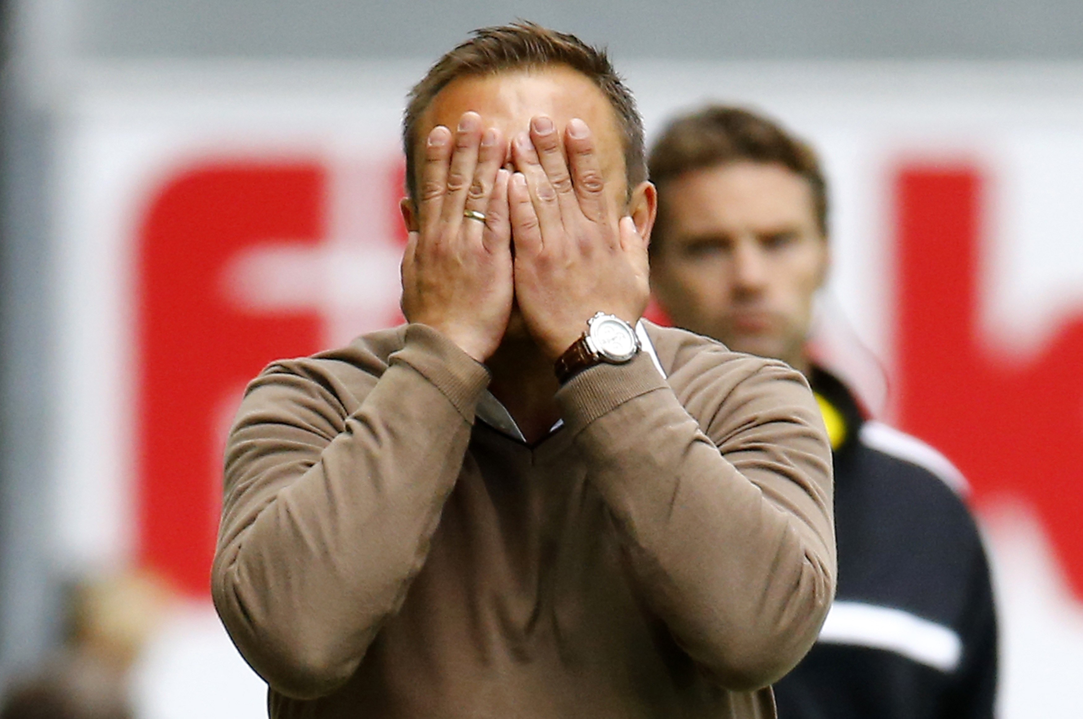 Andre Breitenreiter, coach of SC Paderborn reacts during their first ever German first division Bundesliga soccer match against FSV Mainz 05 in Paderborn, August 24, 2014. Paderborn finished last year's second division season second and was promoted into 