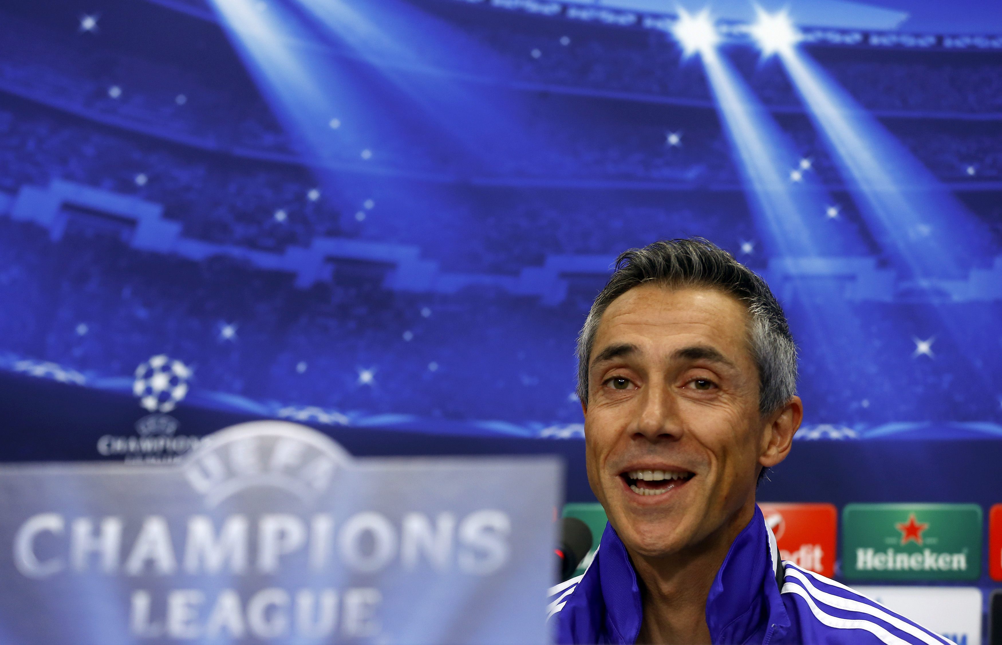 FC Basel's coach Paulo Sousa smiles as he addresses a news conference ahead of their Champions League Group B match against Liverpool in Basel September 30, 2014. REUTERS/Arnd Wiegmann (SWITZERLAND - Tags: SPORT SOCCER)