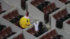 A costumed mascot waits for the men's quarter-final match between Rafael Nadal of Spain and Martin Klizan of Slovakia at the 