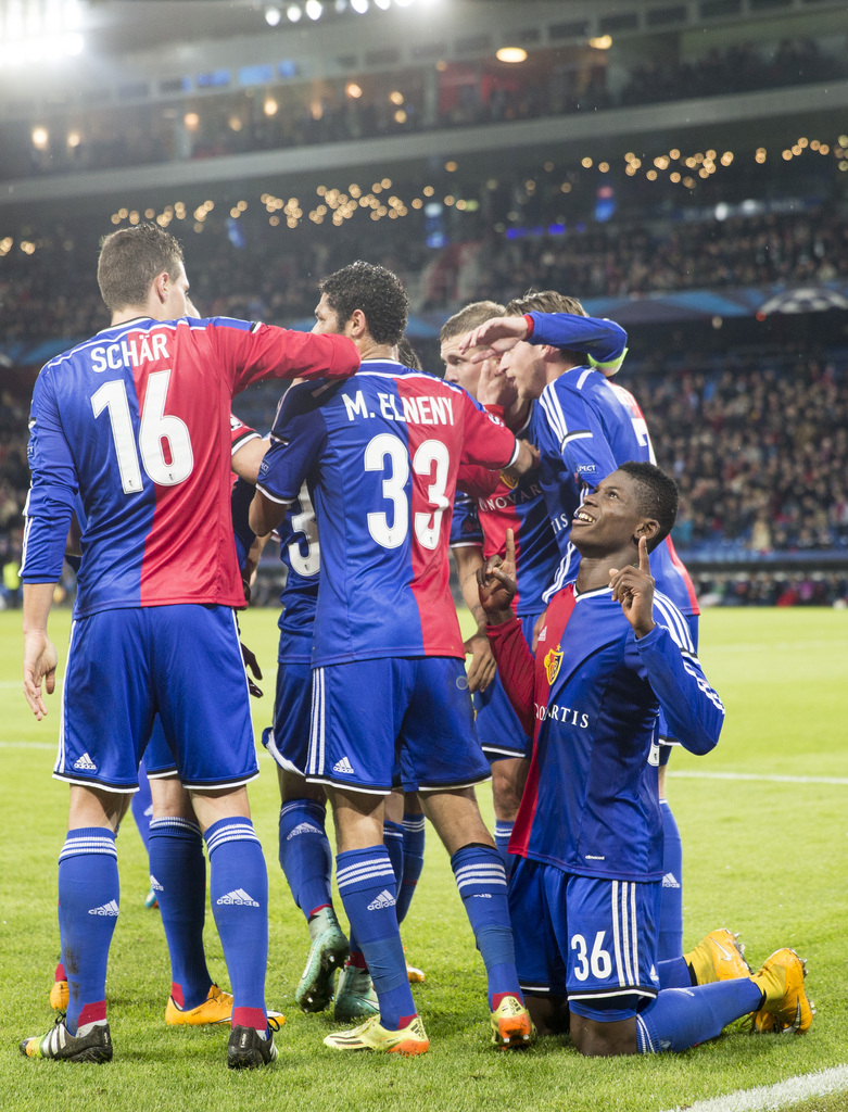 FC Basel's players cheer after Basel's Breel Donald Embolo, down right, scored the 1:0 during an UEFA Champions League group B matchday 4 soccer match between Switzerland's FC Basel 1893 and Bulgaria's PFC Ludogorets Razgrad in the St. Jakob-Park stadium in Basel, Switzerland, on Tuesday, November 4, 2014. (KEYSTONE/Patrick Straub)