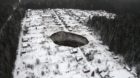 An aerial view shows a sinkhole 3.5 km (2 miles) to the east of Solikamsk-2 mine in Perm region, November 20, 2014. Shares in