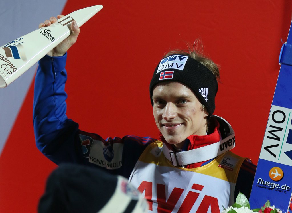 epa04529480 Second placed Anders Fannemel of Norway reacts during the award ceremony of the HS134 Large Hill Individual competition at the FIS Ski Jumping World Cup in Nizhny Tagil, Russia, 14 December 2014. EPA/SERGEI ILNITSKY
