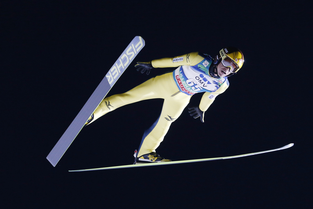 Noriaki Kasai of Japan soars during the World Cup men's ski jump, large hill, in Lillehammer, Norway, Sunday Dec. 7, 2014. Noriaki Kasai placed 17th. (AP Photo/Cornelius Poppe, NTB Scanpix) NORWAY OUT