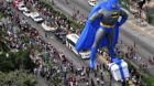 A balloon in the shape of comic hero Batman floats during a Christmas parade along the waterfront of the tourist resort of Ac