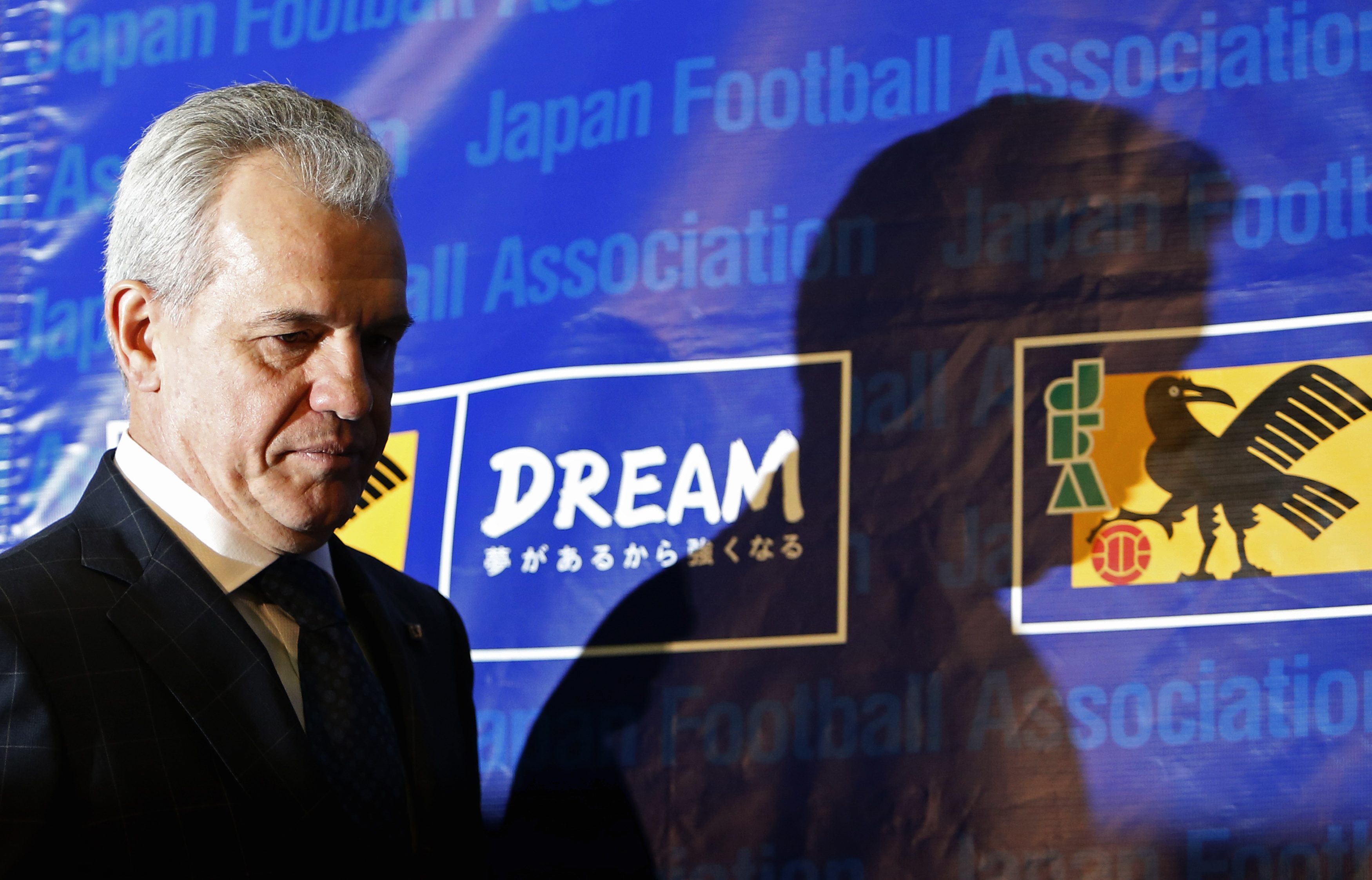 Japan's national soccer team head coach Javier Aguirre of Mexico walks into a news conference at the Japan Football Association headquarters in Tokyo in this December 27, 2014 file photograph. The Japan Football Association (JFA) announced on February 3, 2015 they have terminated the contract of coach Javier Aguirre. REUTERS/Yuya Shino/Files (JAPAN - Tags: SPORT SOCCER)