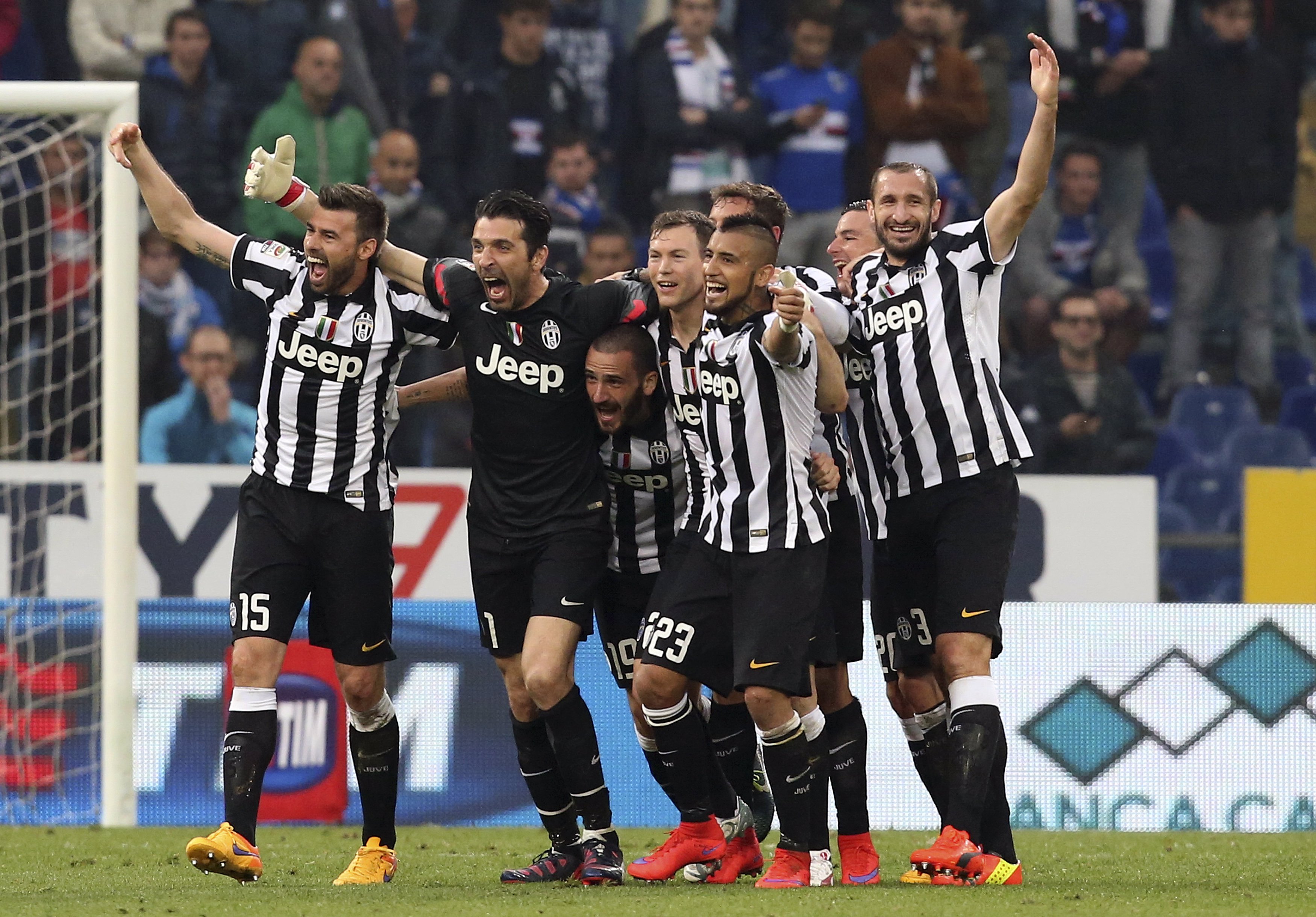 Juventus' players celebrate at the end of their Serie A soccer match against Sampdoria at the Marassi stadium in Genoa, Italy May 2, 2015. Juventus won a fourth successive Serie A crown, and their first under coach Massimiliano Allegri, by beating Sampdoria 1-0 on Saturday. REUTERS/Stefano Rellandini TPX IMAGES OF THE DAY