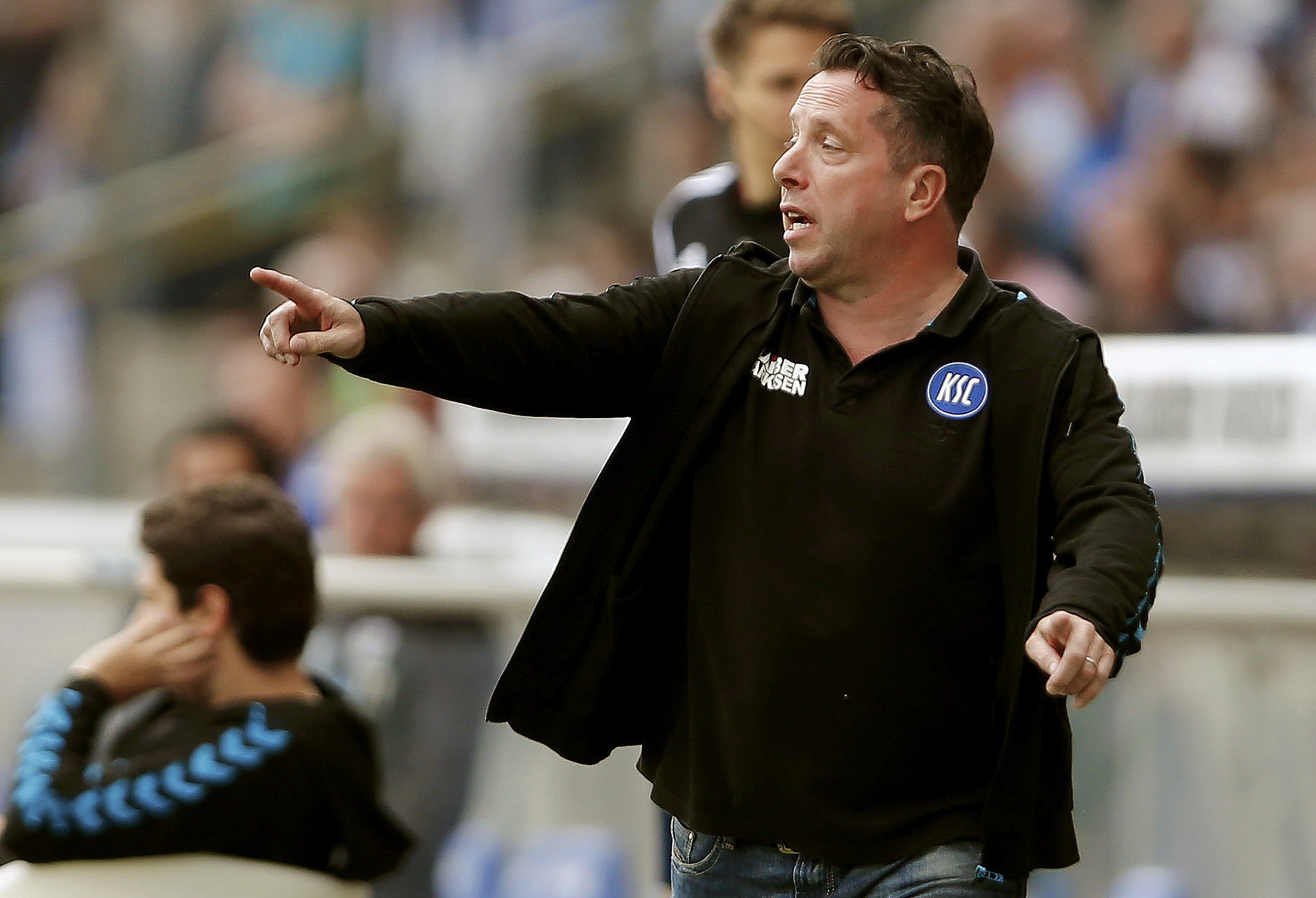 Karlsruhe SC's coach Markus Kauczinski gestures during their German second division Bundesliga soccer match against TSV 1860 Munich in Karlsruhe, Germany, May 24, 2015. ONLINE USAGE DURING MATCH TIME TO 15 PICTURES PER GAME. IMAGE SEQUENCES TO SIMULATE VIDEO IS NOT ALLOWED AT ANY TIME. FOR FURTHER QUERIES PLEASE CONTACT DFL DIRECTLY AT + 49 69 650050. DFL RULES TO LIMIT THE ONLINE USAGE DURING MATCH TIME TO 15 PICTURES PER GAME. IMAGE SEQUENCES TO SIMULATE VIDEO IS NOT ALLOWED AT ANY TIME. FOR FURTHER QUERIES PLEASE CONTACT DFL DIRECTLY AT + 49 69 650050