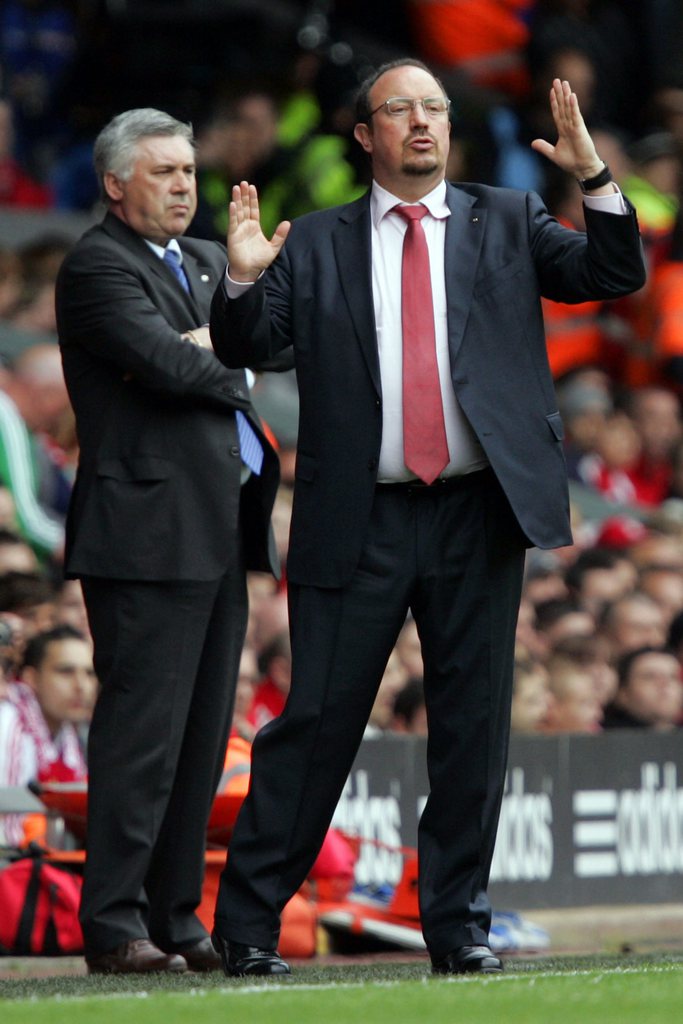 epa04781078 (FILES) A file picture dated 02 May 2010 of the then Liverpool manager Rafael Benitez (R) and then Chelsea manager Carlo Ancelotti (L) during the English Premier League fixture between Liverpool and Chelsea at Anfield, in Liverpool, Britain. Spanish Primera Division side Real Madrid appoint on 03 June 2015 Rafael Ben�tez as the new coach on a three-season contract. EPA/LEE SANDERS *** Local Caption *** 02140347