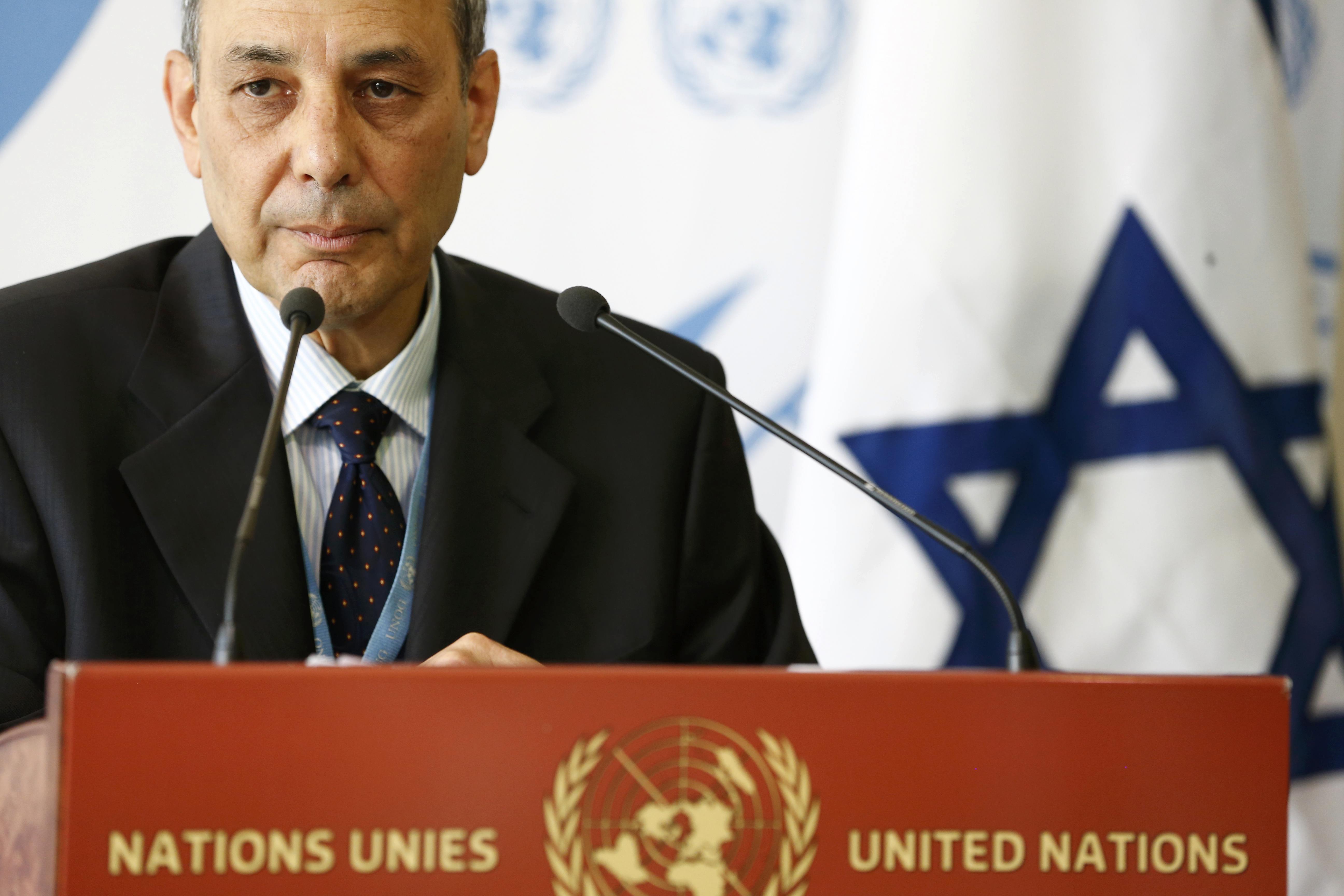 Israeli ambassador Eviatar Manor speaks to the press at a stake-out after presentation of report by the Independent Commission of Inquiry on the 2014 Gaza Conflict at the United Nations headquarters in Geneva, Switzerland, June 29, 2015. REUTERS/Pierre Albouy