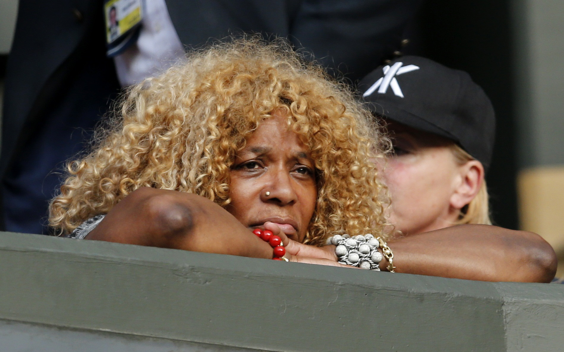 Oracene Price, mother of Serena Williams of the U.S.A. watches during her match against Heather Watson of Britain at the Wimbledon Tennis Championships in London, July 3, 2015. REUTERS/Suzanne Plunkett