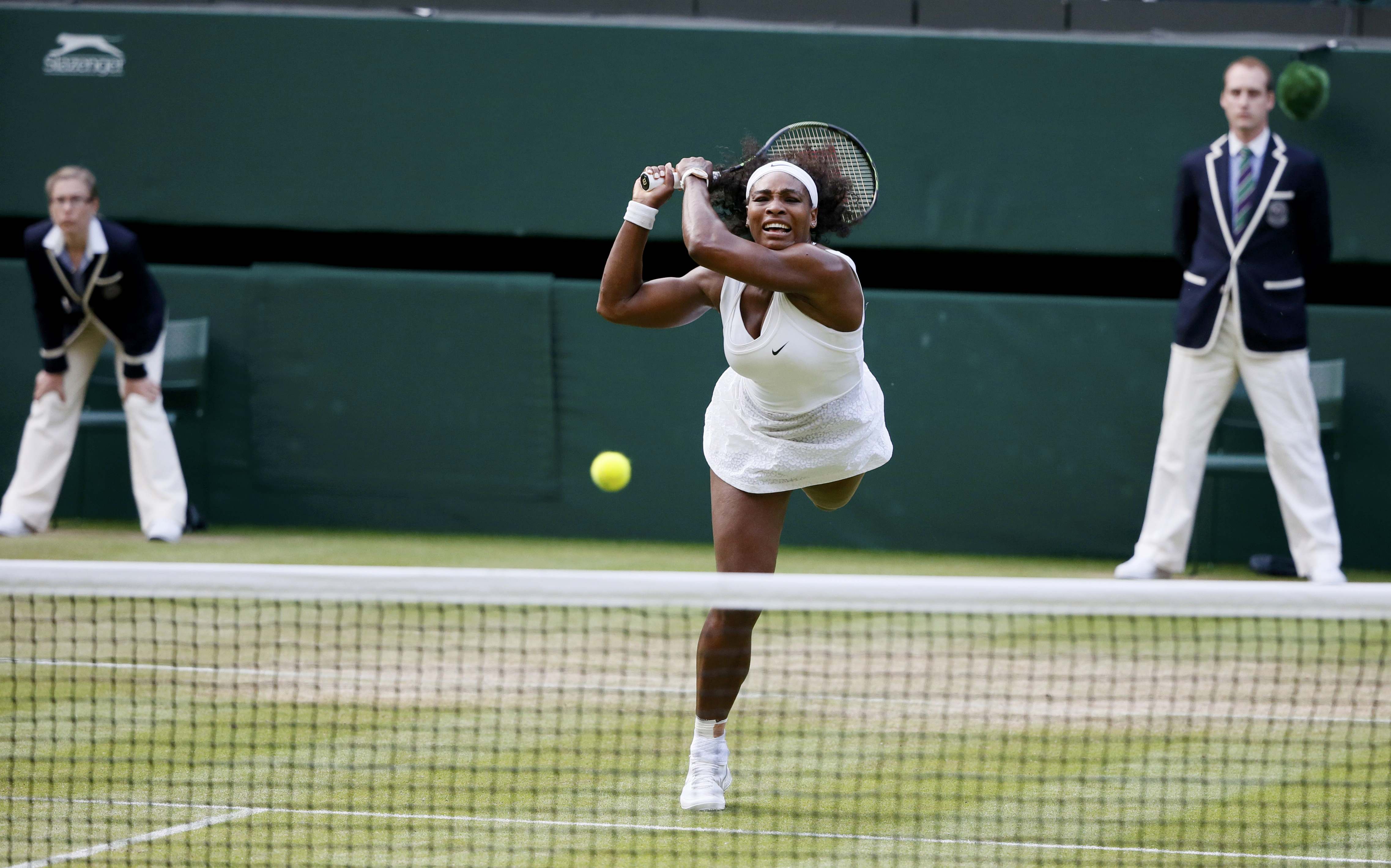Serena Williams of the U.S.A. hits the ball during her match against Heather Watson of Britain at the Wimbledon Tennis Championships in London, July 3, 2015. REUTERS/Stefan Wermuth