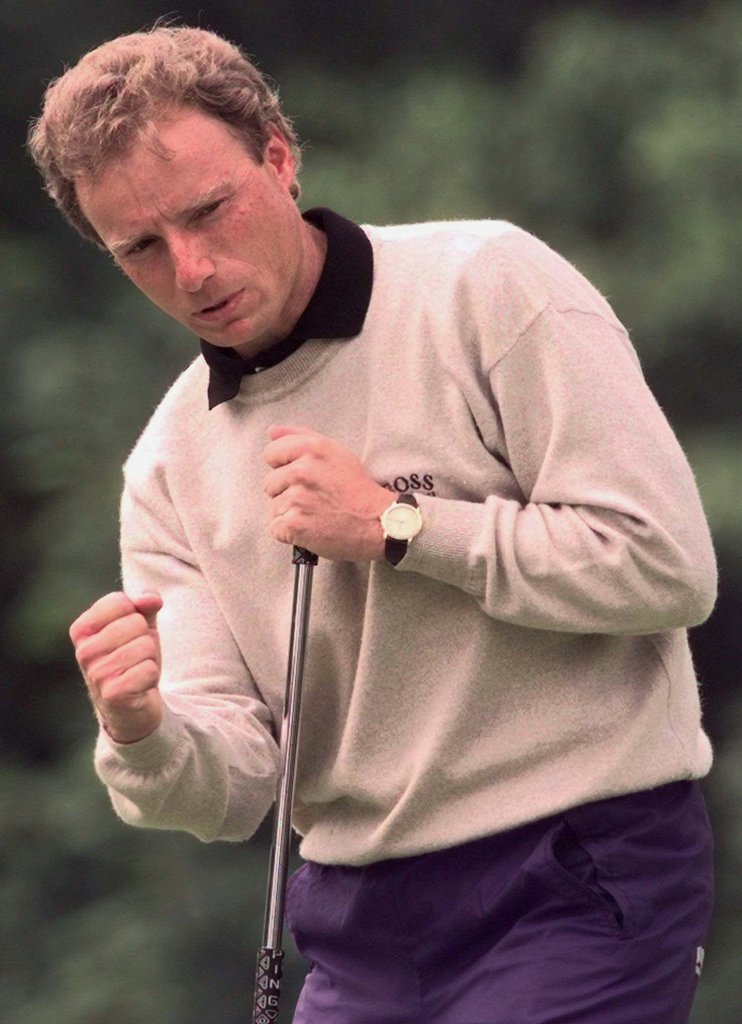 Bernhard Langer of Germany pumps his fist after a birdie on the 16th hole during the first round of the PGA Championship at Wentworth in Virginia Water, England Friday May 23, 1997. (AP Photo/Lynne Sladky)