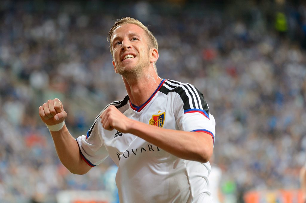 epa04865504 Marc Janko of FC Basel celebrates after scoring the 2-0 goal during the UEFA Champions League third qualifying round first leg soccer match between Lech Poznan and FC Basel in Poznan, Poland, 29 July 2015. EPA/Jakub Kaczmarczyk POLAND OUT