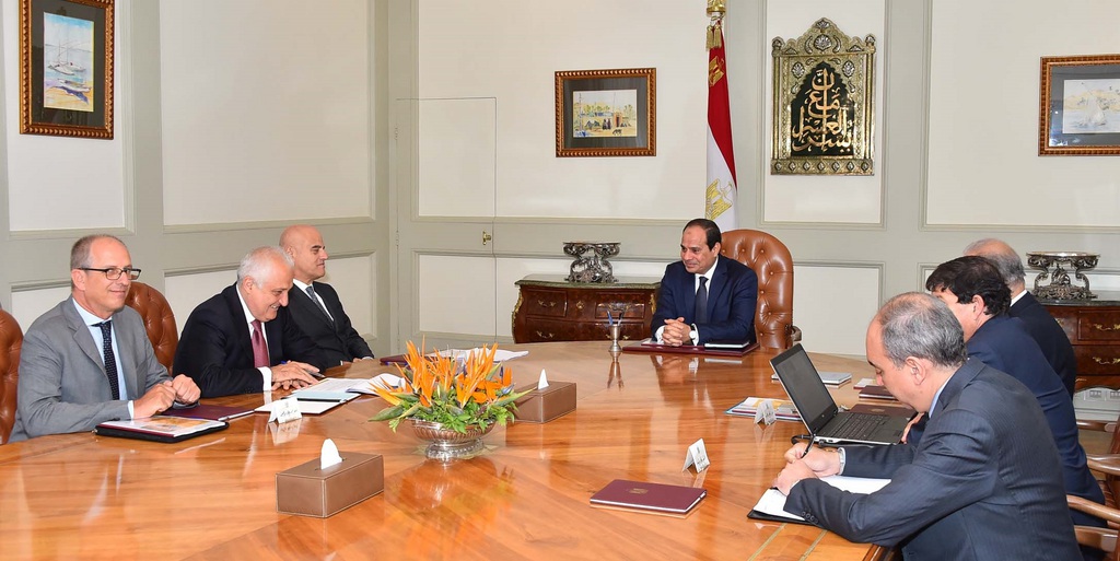 <p>In this Saturday, Aug. 29, 2015 photo provided by Egypt's state news agency MEAN, Eni CEO Claudio Descalzi, third left, and his delegation meet with Egyptian President Abdel-Fattah el-Sissi, center, and an Egyptian delegation, in Cairo, Egypt. The Italian energy company Eni SpA announced Sunday, Aug. 30, 2015, it has discovered a 