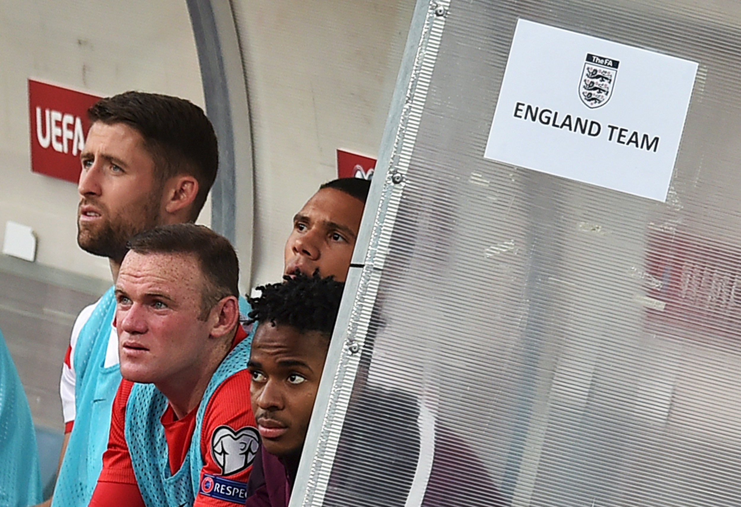 England's Wayne Rooney (2nd L) sits in the bench after being substituted during their Euro 2016 qualifying soccer match against San Marino at the Olympic stadium in Serravalle, San Marino, September 5, 2015. REUTERS/Alberto Lingria