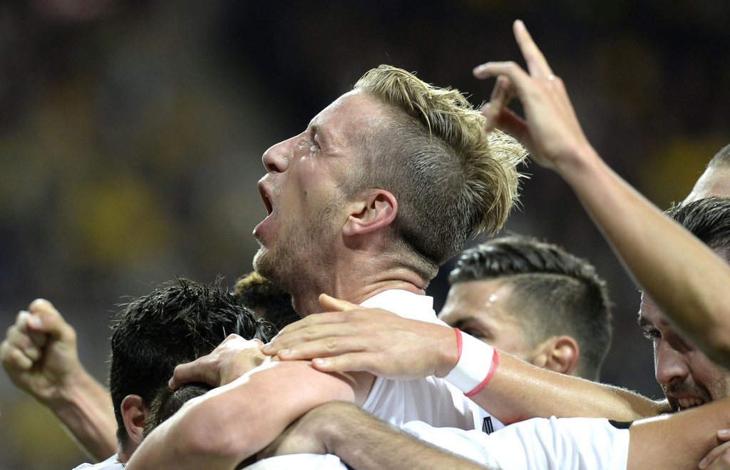 epa04920860 Austria's Marc Janko celebrates after scoring the 2-0 goal during the UEFA Euro 2016 Group G qualifier match between Sweden and Austria at the Friends arena in Stockholm, Sweden, 08 September 2015. EPA/ROBERT JAEGER