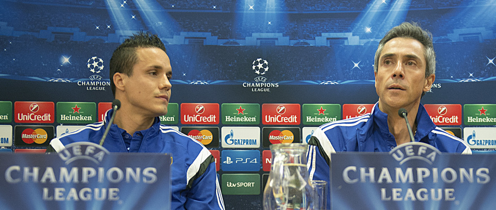 Basel's Philipp Degen, left, and Portuguese head coach Paulo Sousa, right, speak during a press conference at the Anfield stadium in Liverpool, Great Britain, on Monday, December 8, 2014. Switzerland's FC Basel 1893 is scheduled to play against Britain's Liverpool FC in an UEFA Champions League group B matchday 6 soccer match on Tuesday, December 9, 2014. (KEYSTONE/Georgios Kefalas)