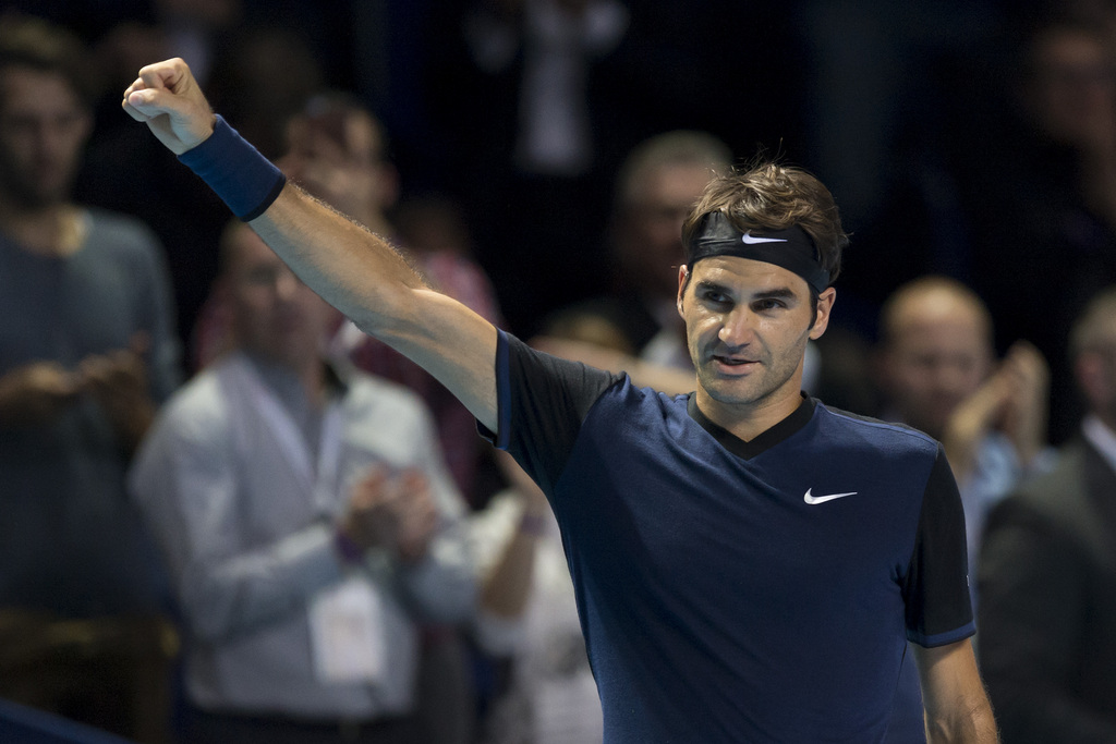 Switzerland's Roger Federer cheers after winning his round of sixteen match against Germany's Philipp Kohlschreiber at the Swiss Indoors tennis tournament at the St. Jakobshalle in Basel, Switzerland, on Thursday, October 29, 2015. (KEYSTONE/Georgios Kefalas)