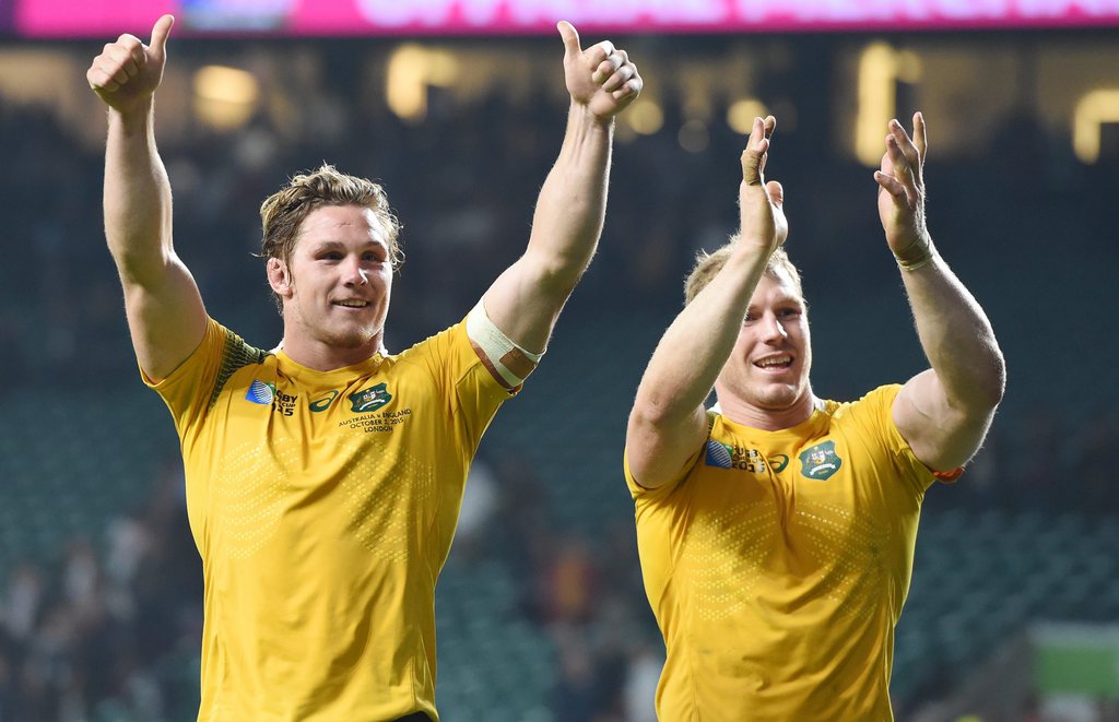 epa04962236 Australia Michael Hooper (L) and David Pocock (R) greet supporters after winning the Rugby World Cup 2015 match in Pool A between England and Australia at Twickenham in London, Britain, 03 October 2015. EPA/FACUNDO ARRIZABALAGA EDITORIAL USE ONLY/ NO COMMERCIAL SALES / NOT USED IN ASSOCATION WITH ANY COMMERCIAL ENTITY