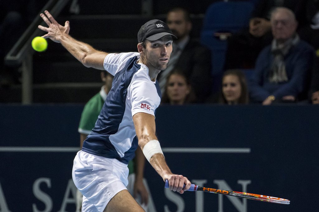 epa05003632 Croatia's Ivo Karlovic in action against France's Richard Gasquet during their quarter final match at the Swiss Indoors tennis tournament at the St. Jakobshalle in Basel, Switzerland, 30 October 2015. EPA/ALEXANDRA WEY