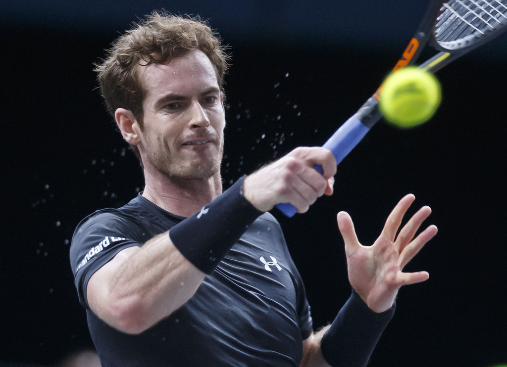 Britain's Andy Murray returns the ball to France's Richard Gasquet during their quarterfinal match of the BNP Masters tennis tournament at the Paris Bercy Arena, in Paris, France, Friday, Nov. 6, 2015.Murray won 7-6, 3-6, 6-3. (AP Photo/Michel Euler)