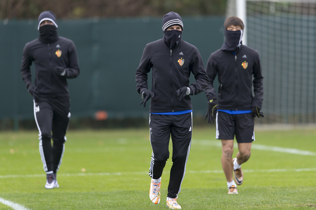 Breel Embolo, Luca Zuffi, and Yoichiro Kakitani, from left, of Switzerland's soccer team FC Basel during a training session in the St. Jakob-Park training area in Basel, Switzerland, on Wednesday, November 25, 2015. Switzerland's FC Basel 1893 is scheduled to play against Italy's ACF Fiorentina in an UEFA Europa League group I group stage matchday 5 soccer match on Thursday, November 26, 2015. (KEYSTONE/Georgios Kefalas)