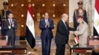 epa04971978 Egyptian President Abdel Fattah al-Sisi (C, back) and French Prime Minister Manuel Valls (L, back) look on as Fre