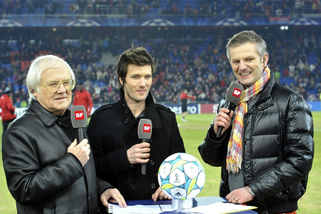 Gilbert Gress, Raphael Wicky and Rainer Maria Salzgeber, from left, prior to the Champions League round of sixteen first leg match between Switzerland's FC Basel and Germany's FC Bayern Munich in the St. Jakob-Park stadium in Basel, Switzerland, on Wednes