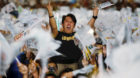 A supporter of Democratic Progressive Party (DPP) Chairperson and presidential candidate Tsai Ing-wen celebrates to prelimina