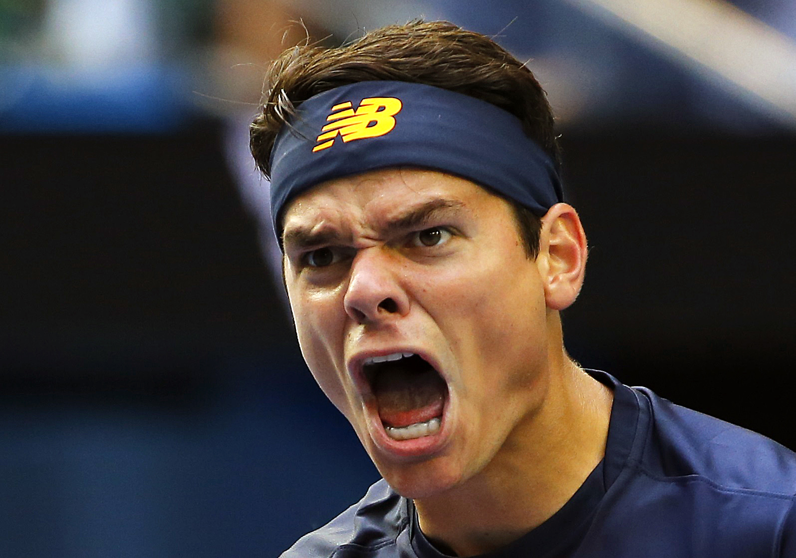 Canada's Milos Raonic reacts during his fourth round match against Switzerland's Stan Wawrinka at the Australian Open tennis tournament at Melbourne Park, Australia, January 25, 2016. REUTERS/Thomas Peter