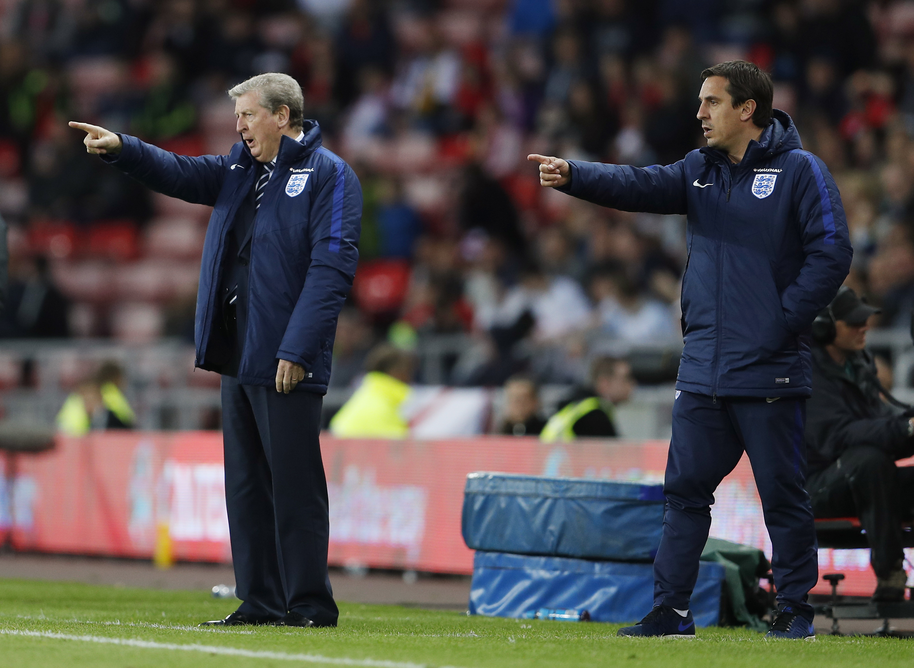 Britain Football Soccer - England v Australia - International Friendly - Stadium of Light, Sunderland - 27/5/16 England manager Roy Hodgson and assistant Gary Neville (R) Action Images via Reuters / Lee Smith Livepic EDITORIAL USE ONLY.